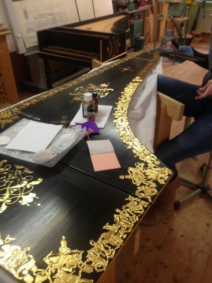 Gesso gilding, reconstruction after traces on the original instrument.
