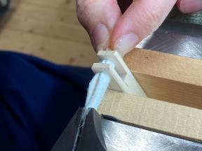 Durchziehen durch die Kapsel